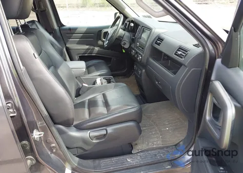 2014 Honda Ridgeline Rtl z USA, uszkodzony, nr VIN 5FPYK1F50EB003633